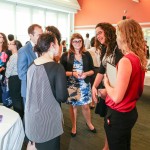 People talking at 3rd Annual Externship Expo