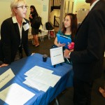 People talking at 3rd Annual Externship Expo