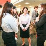 People talking at 3rd Annual Externship Expo