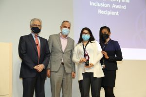 Dr. Diane Calderon-Villanueva (center) receives first Diversity, Equity and Inclusion Award at annual recognition ceremony. (L-R) Dr. David A. Heath, Dr. Guilherme Albieri, Dr. Calderon, and Dr. Joy Harwood.