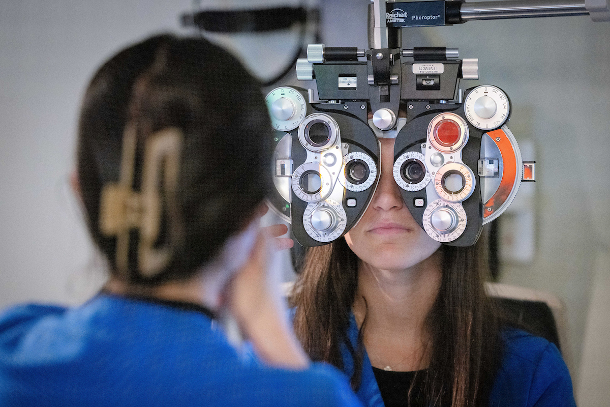 Woman receiving eye exam