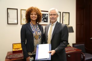 Ms. Gaea Austin receiving Chancellor's Award
