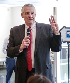 American Optometric Association Trustee Dr. Bill Reynolds addressing participants during the reception